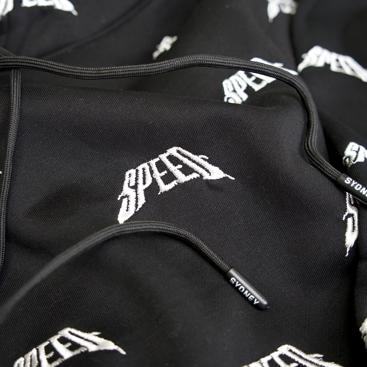 ALL OVER EMBROIDERED LOGO HOODIE